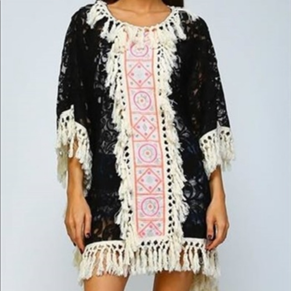 Poncho with fringes